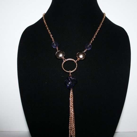 Beautiful long gold necklace with tanzanite beads